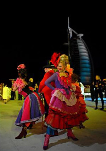 photo of performer in Dubai next to the burj al arab